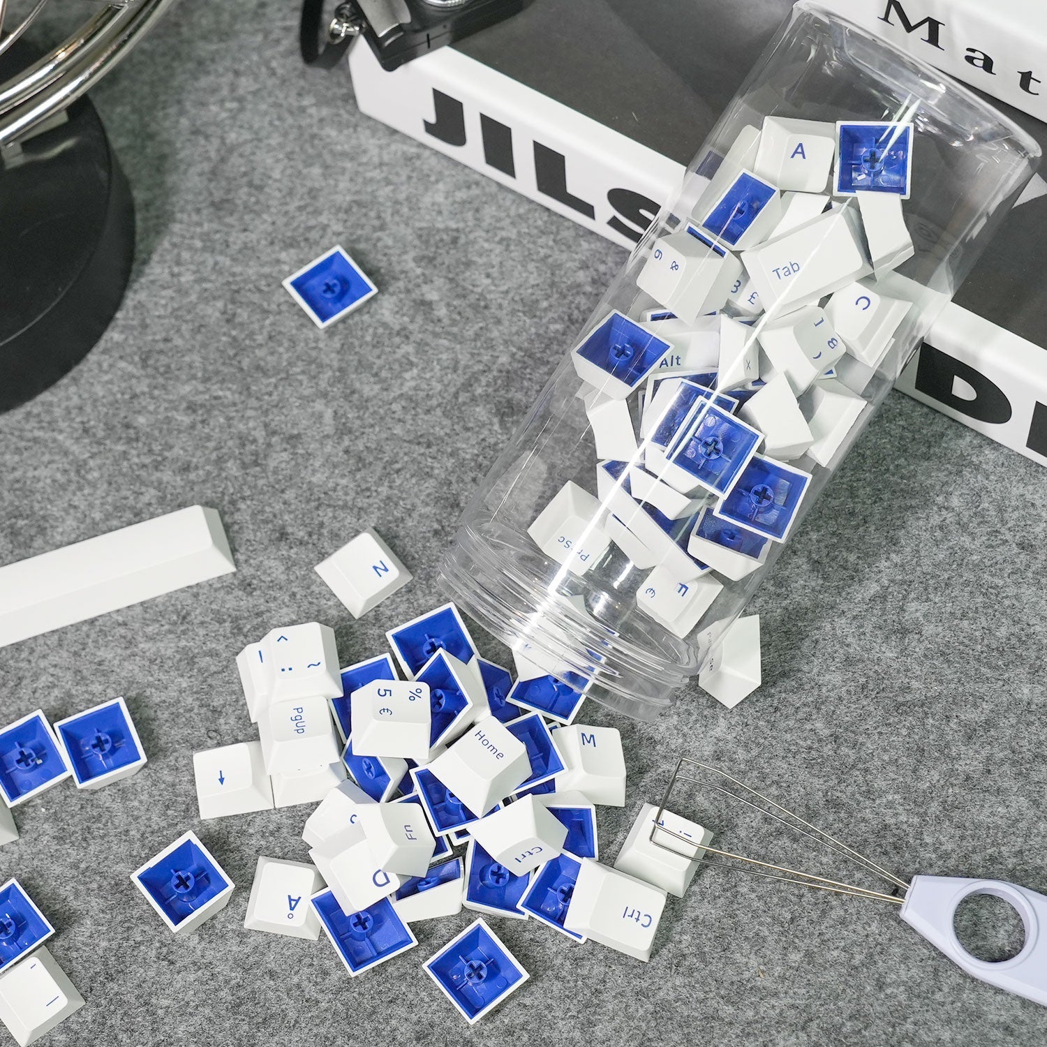 Blue on White ISO Nordic Keycap Set (76-key) on the Desk and in the Jar